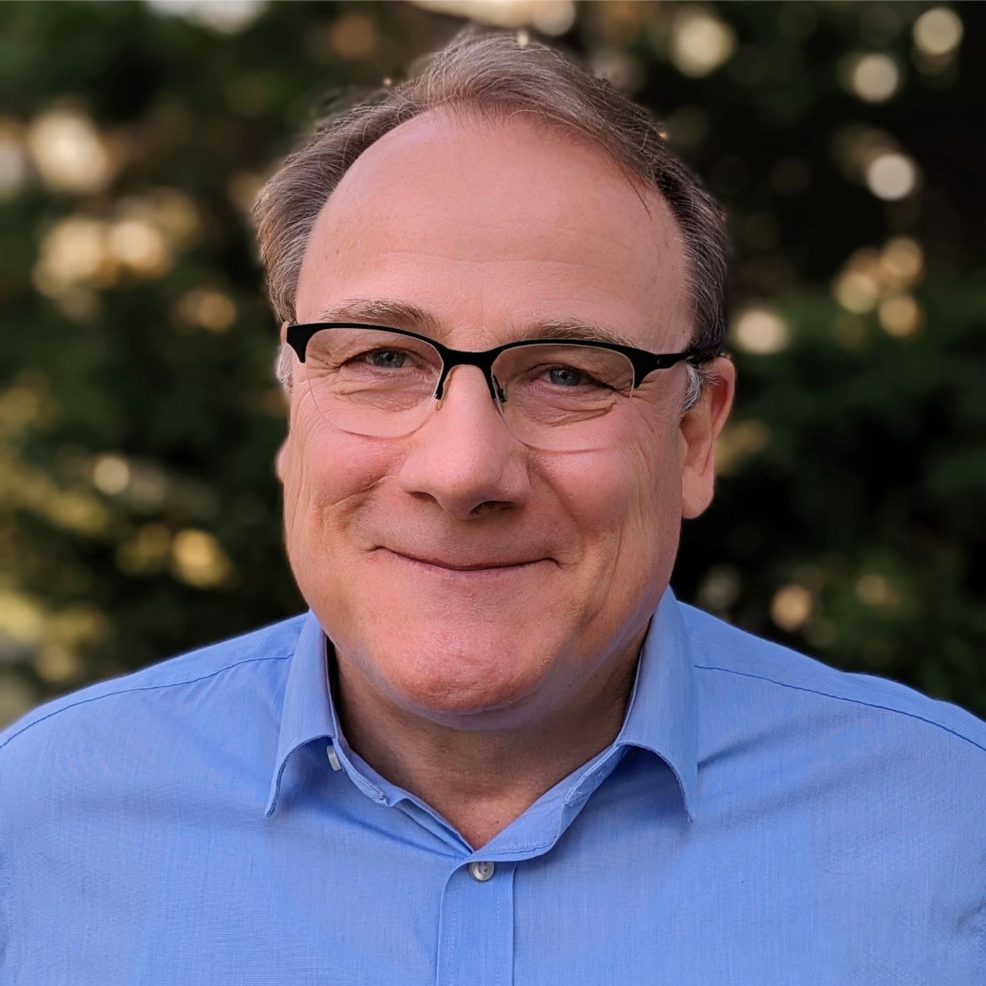 Photo of Peter Leimgruber. Peter is a middle-aged Caucasian man with short brown hair and glasses. 