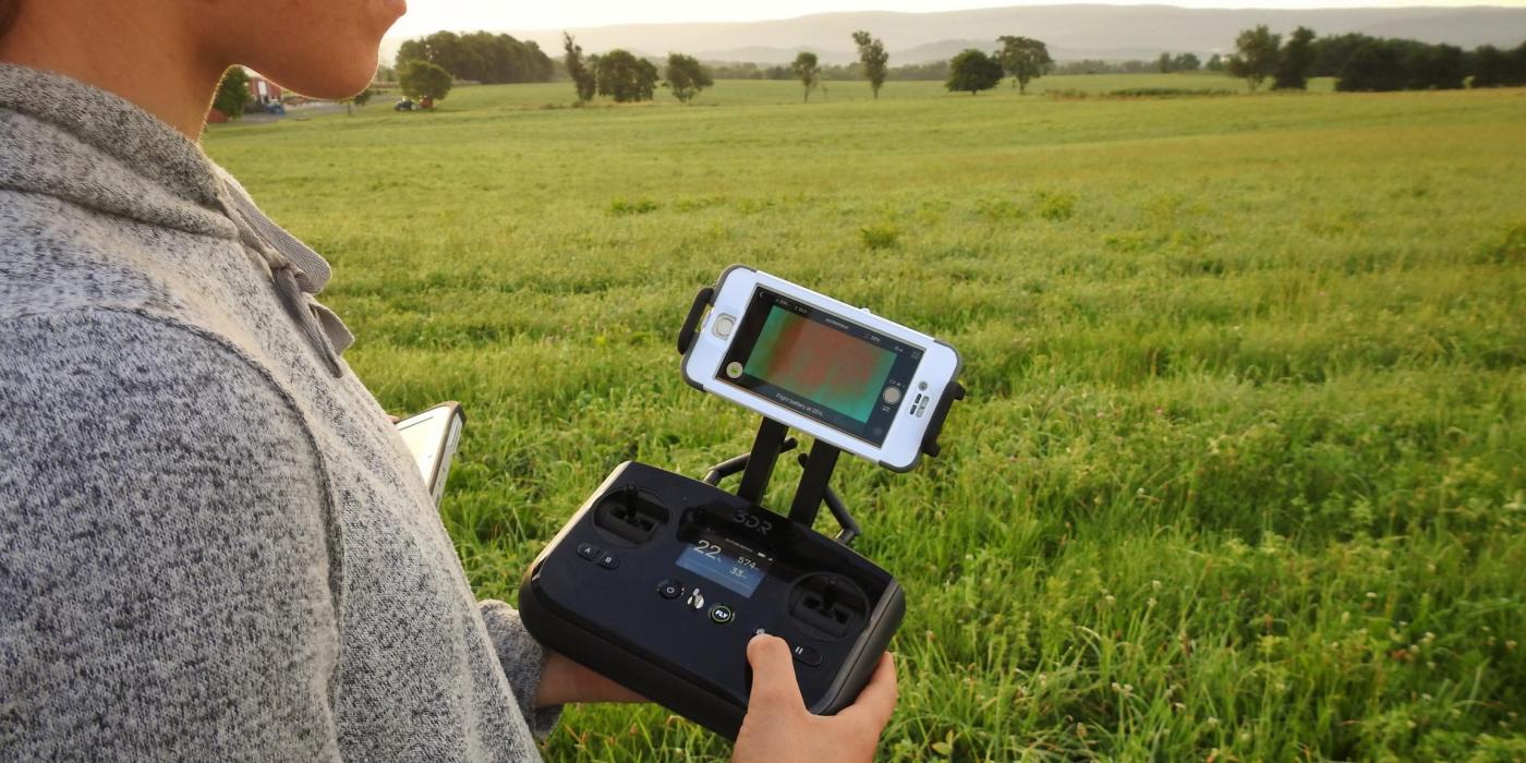 Student operating drone. 