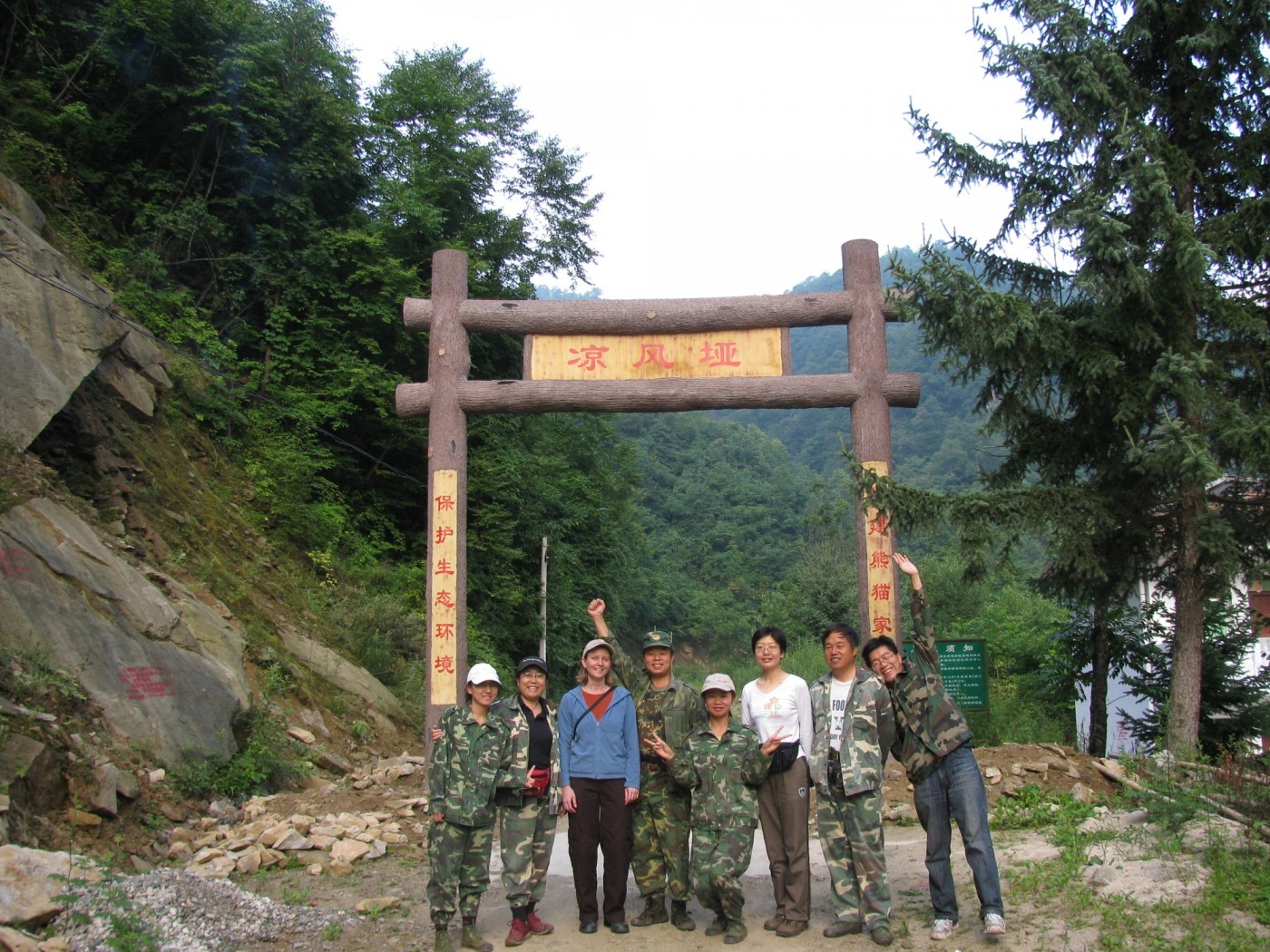 Scientists and students pose together