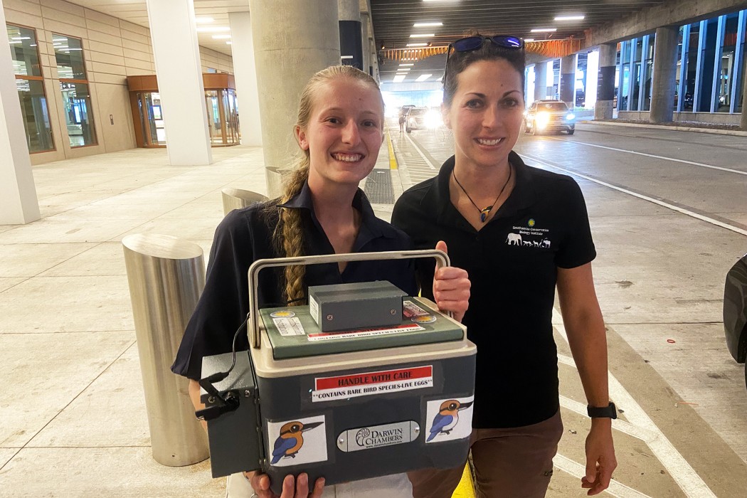 Keepers Julie Buschor (left) and Erica Royer (right) transport a sihek egg to the Sedgewick County Zoo.