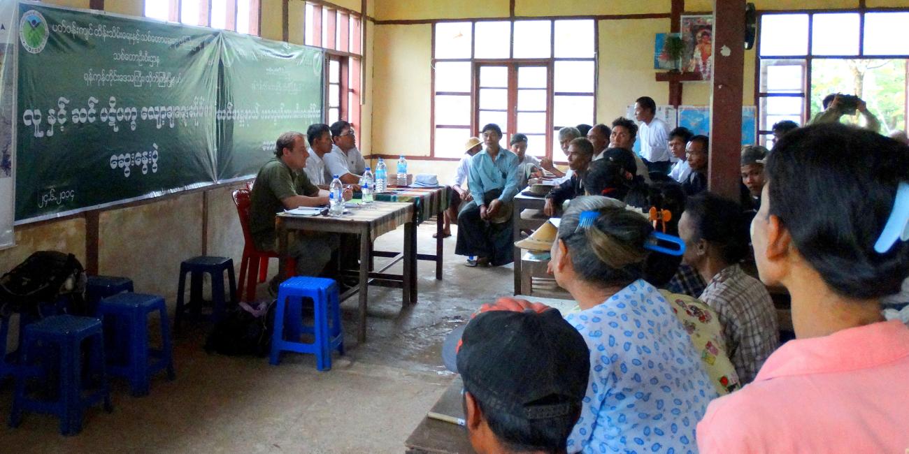 Conservation Ecology Center scientists talk with local communities about how to avoid human-elephant conflict.