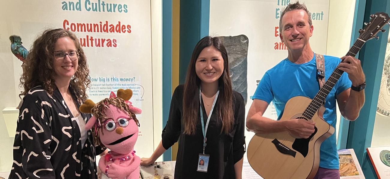 Pinky Jackalope puppet with Nick the Music Man and two educators from American History