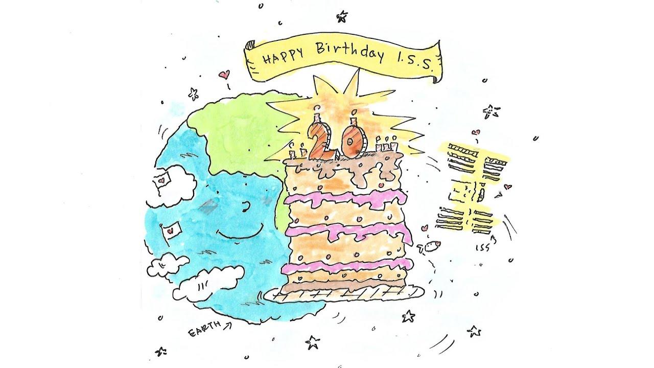 A cartoon drawing of earth helping celebrate the International Space Stations 20th birthday with a pink birthday cake.