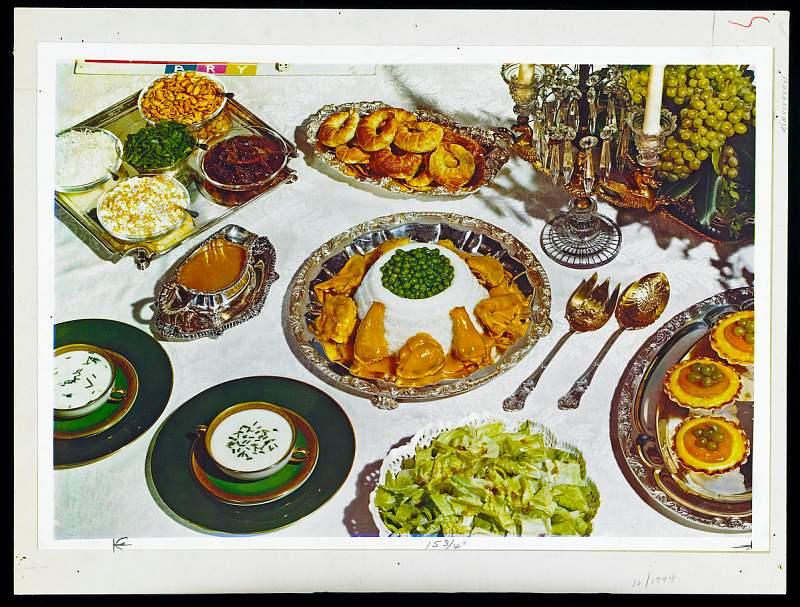 "Food Spread" from National Museum of American History, an image of a fully set table with plates of a variety of foods