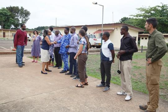 group of colleagues meeting each other in Gabon