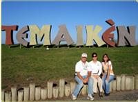 keeper conference posing in front of a sign at Temaiken Biopark