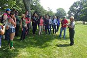 student listen to lecture outside