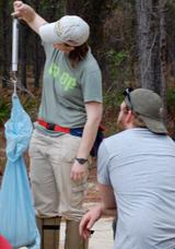 weighing a snake in a bag