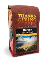 a coffee bag with an image of a mountainous coffee growing landscape