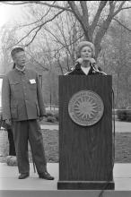 First Lady Patricia Nixon speaks at a podium at the Zoo April 20, 1972, for the official welcome ceremony for giant pandas Ling Ling and Hsing Hsing