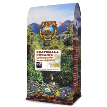 a coffee bag with an image of a rainforest and mountains