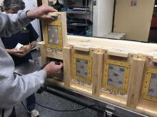 Guam rails placed in shipping crate by Smithsonian scientists