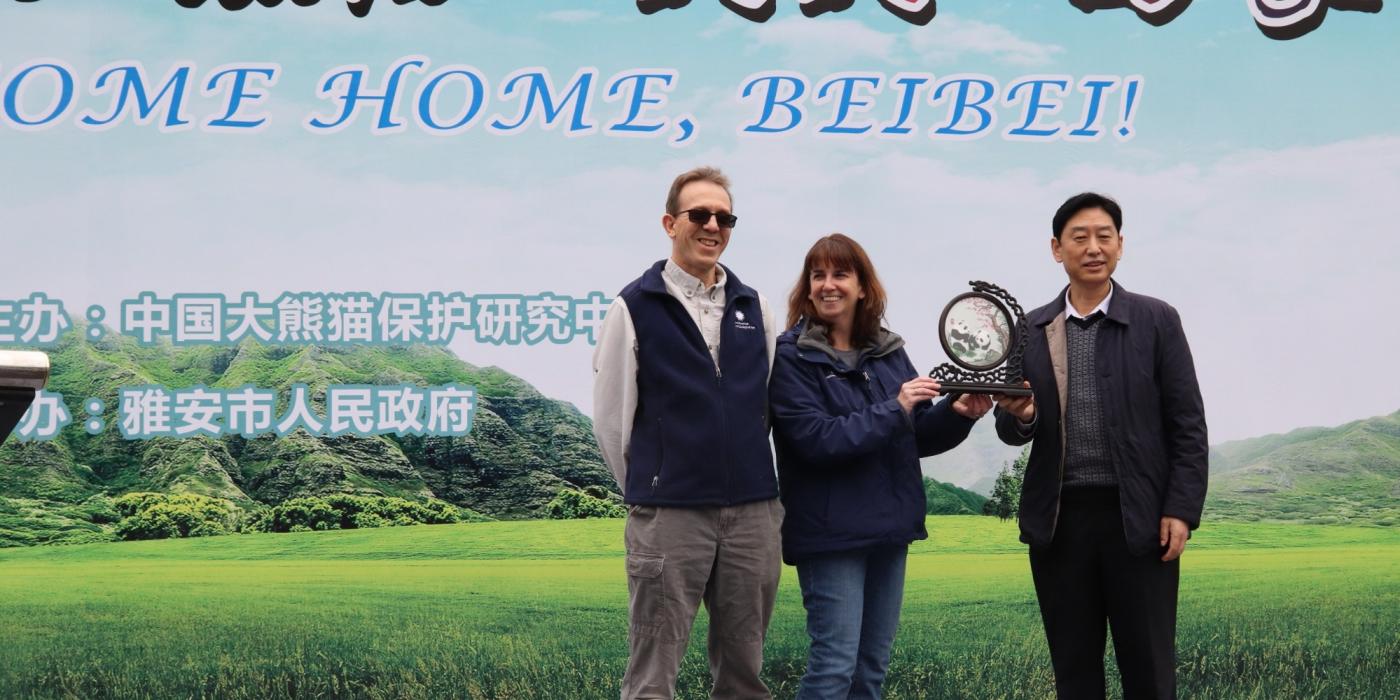 Laurie Thompson and Don Neiffer with Zhang Haiqing at Bei Bei's welcome ceremony. 