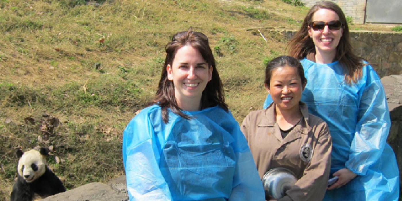 The Zoo's panda keepers pose with panda keepers in China